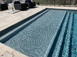 Concrete and tiled steps inside a swimming pool