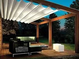 Pergola shade structure beside an outdoor seating area